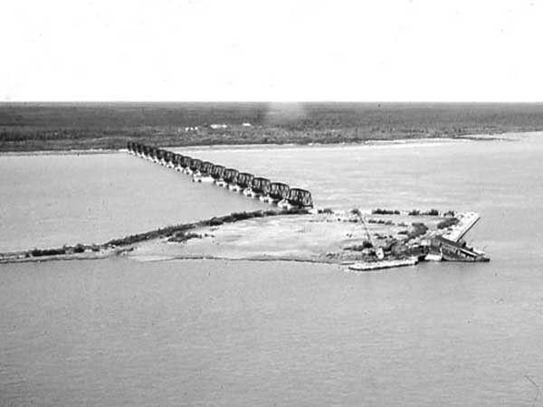 Aerial view of the Port Nelson bridge, showing the abandoned dredge Port Nelson lying on the artificial island at the end of the bridge