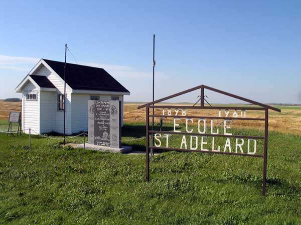 St. Adelard School commemorative sign and replica